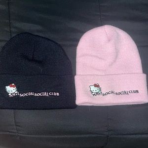 two anti social social club hello kitty beanies
two sanrio assc beanies